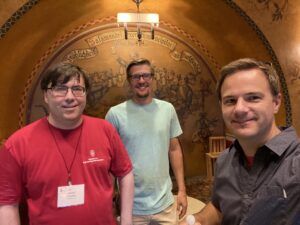 Students smiling at Rathskeller in the Memorial Union.