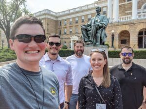 Students pose in front of Bascom Hall