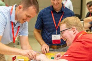 MSEM students Matt Lowink, Mike Schlaak, and Zach Schuler attending the in-person residency.